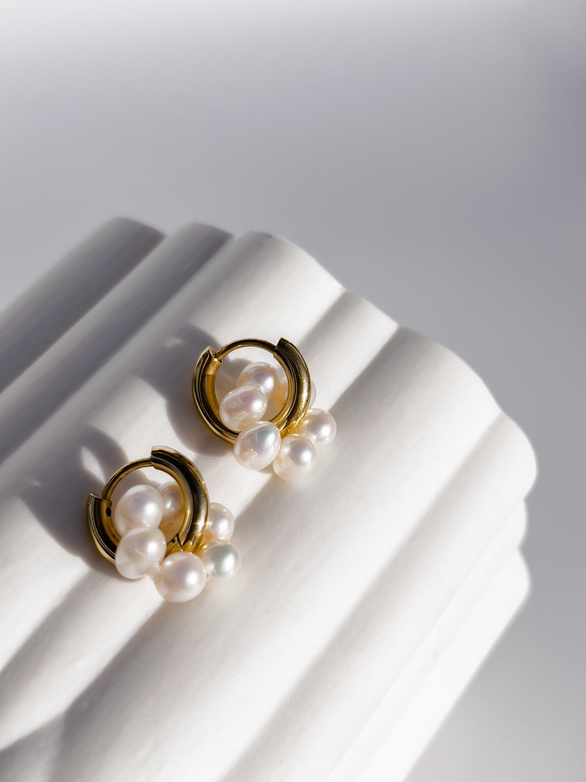 Pearl Halo Hoops - 14 karat Gold Filled Hoops, each suspending a halo of freshwater pearls. This ultra cute pair, can be worn singularly, or combined with other pieces.